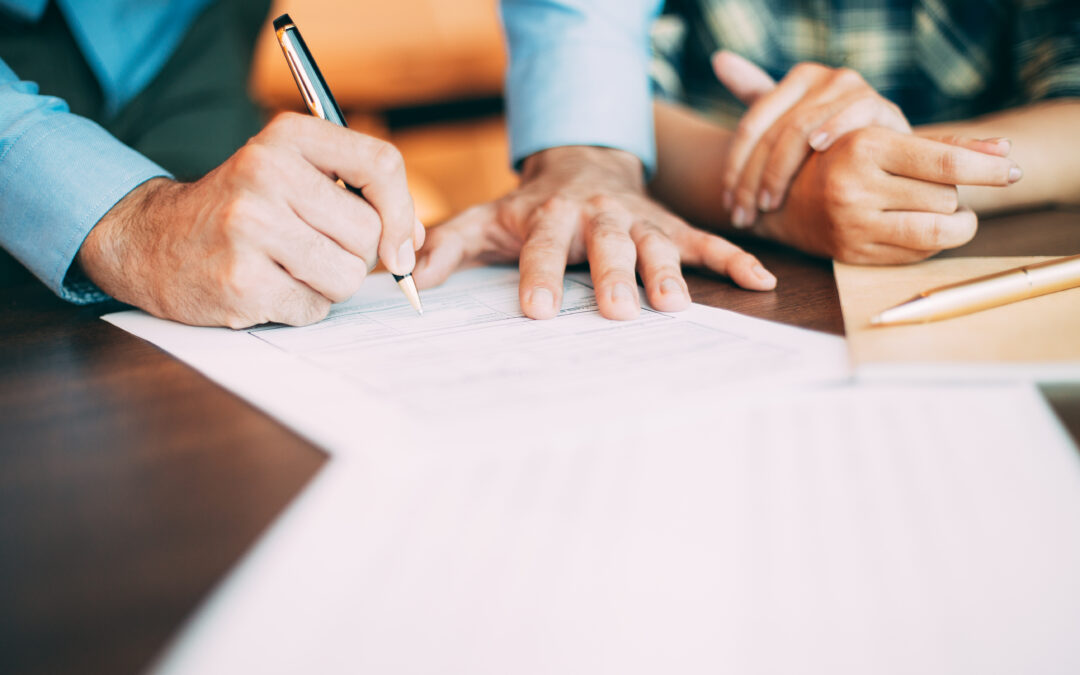 Man signing contract